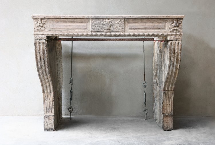 antique fireplace of limestone