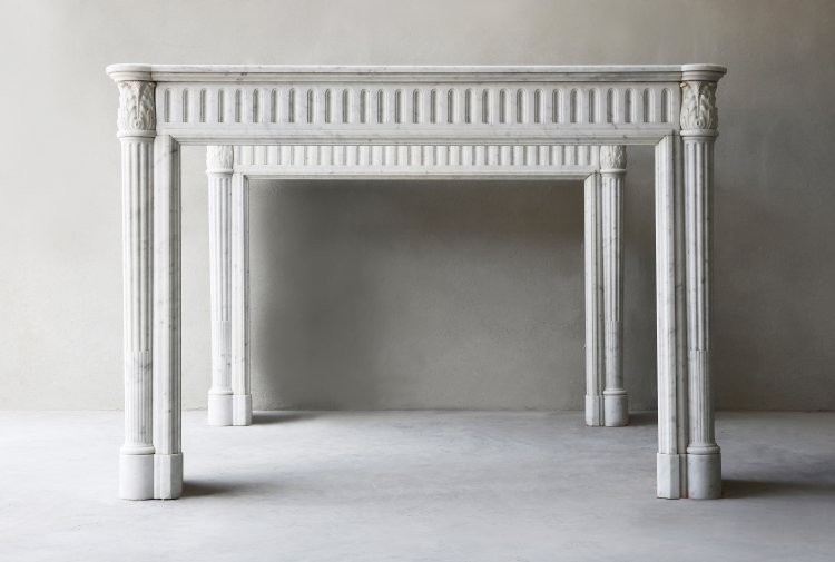 two identical antique fireplaces