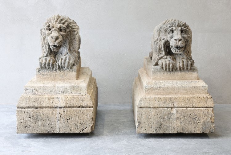 antique set of lions on pedeestal