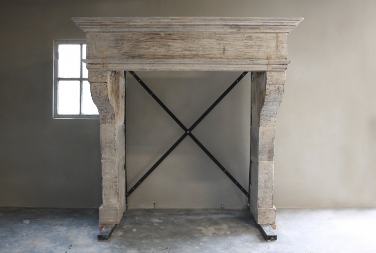 antique castle fireplace of french limestone