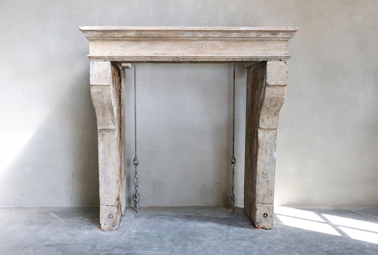 antique fireplace of limestone