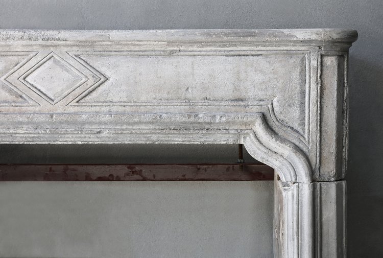 reclaimed french limestone fireplace
