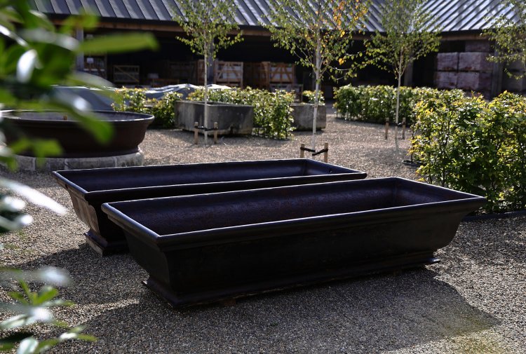 two old troughs of cast iron 