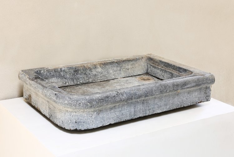 old wash basin of belgian bluestone