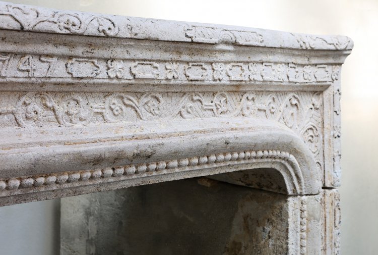 antique fireplace of french limestone