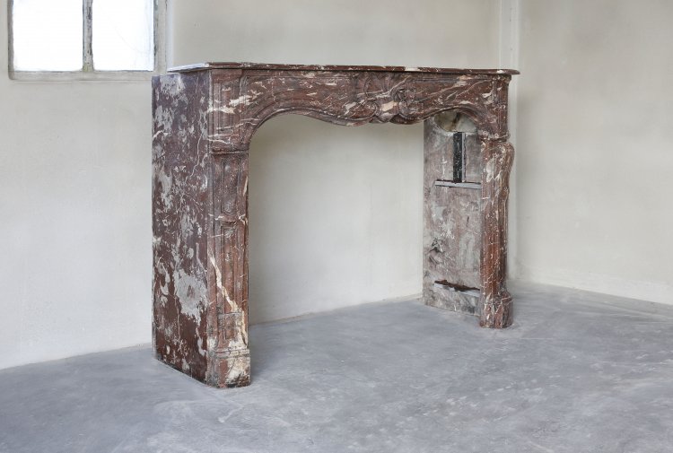 Rouge royal marble fireplace