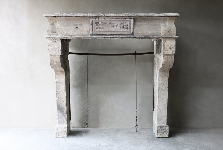 19th century fireplace of french limestone