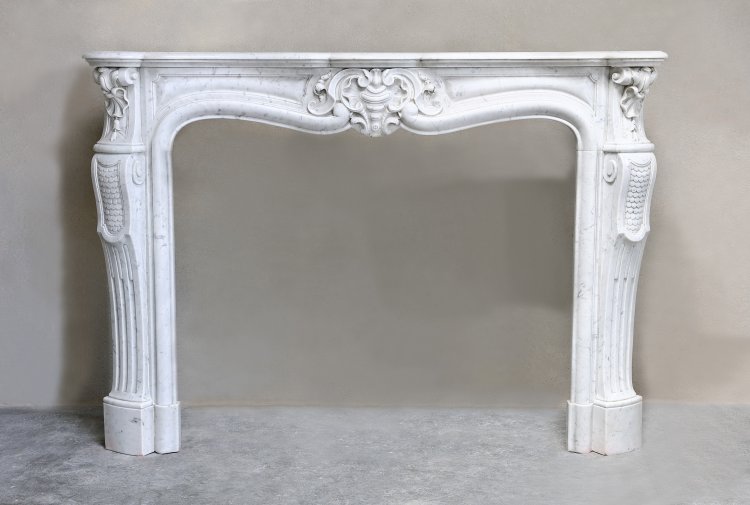 antique fireplace of carrara marble