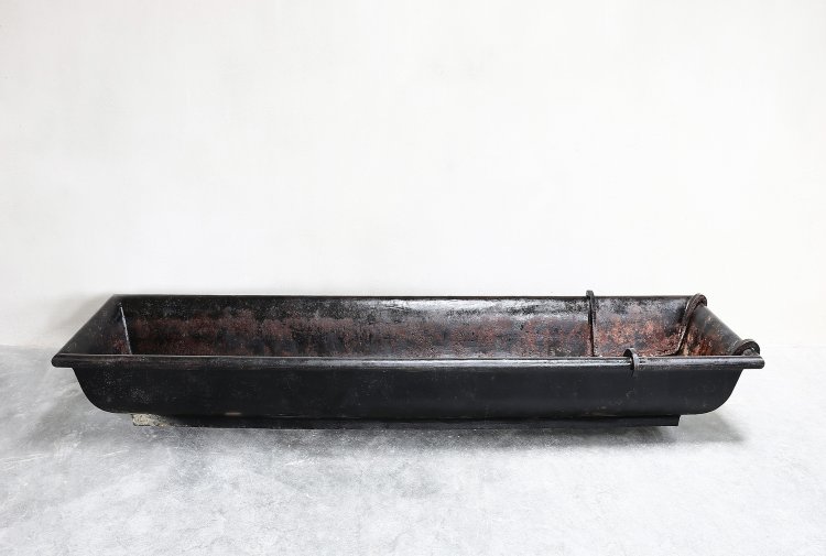 antique trough of cast iron