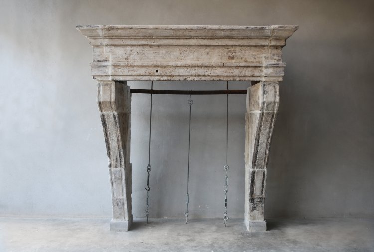 antique french limestone fireplace