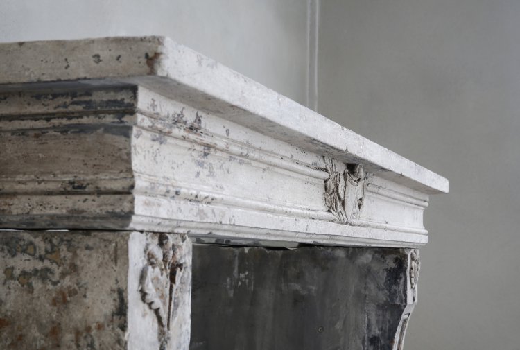 antique mantelpiece of french limestone