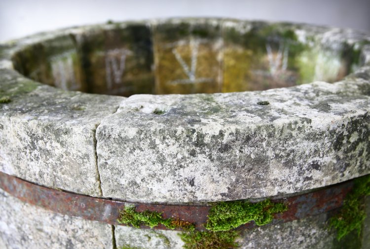 antique French wellhead from limestone