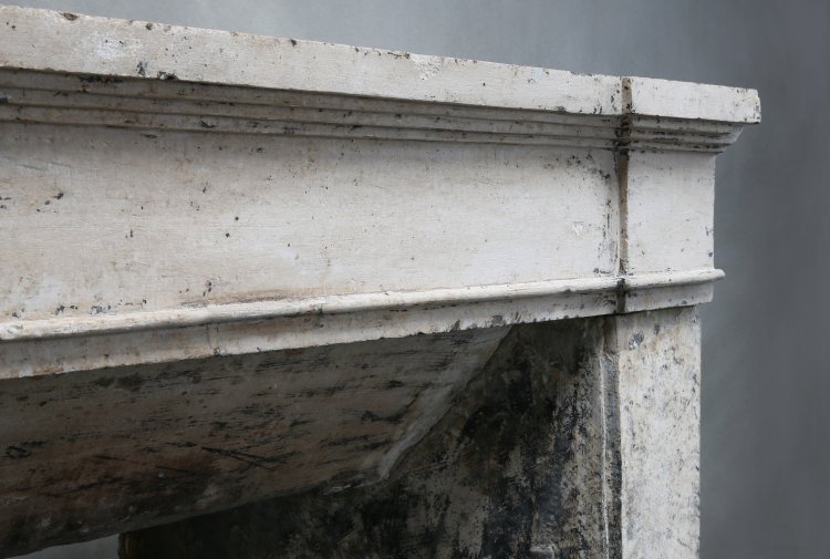 old mantelpiece of french limestone