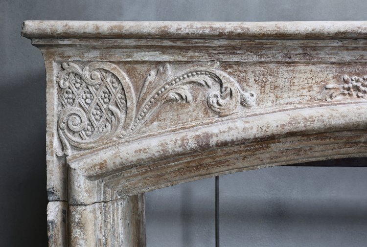 antique fireplace of french limestone