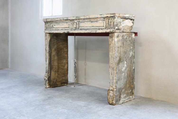 old french mantelpiece of limestone