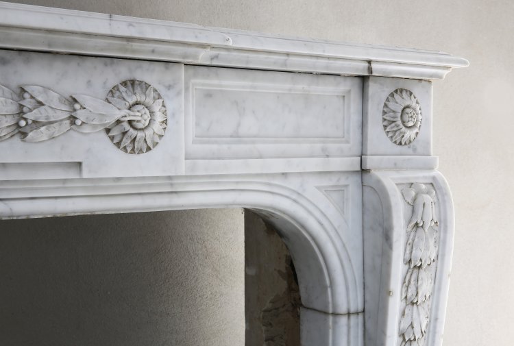 antique mantelpiece of white carrara marble