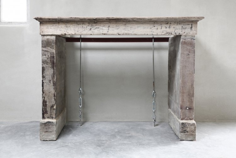 old french fireplace of limestone