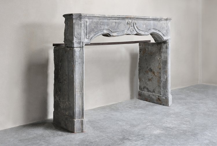 reclaimed fireplace of burgund stone