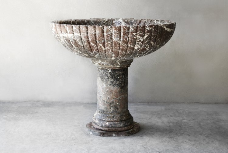 antique baptismal font