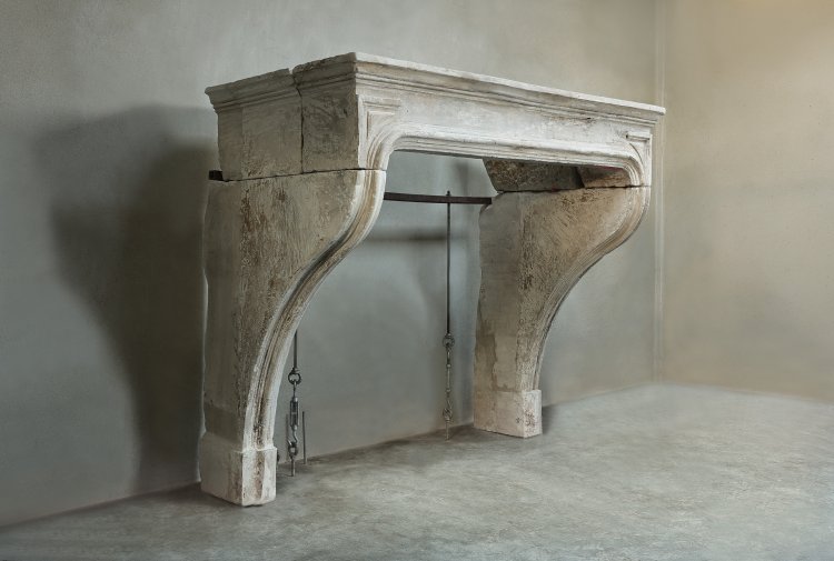 antique mantle of french limestone