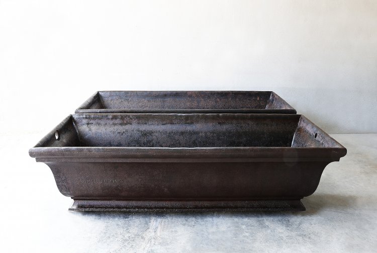 antique set of troughs