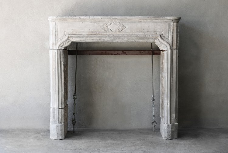 antique fireplace of limestone