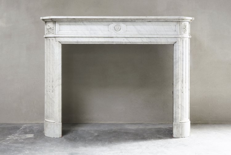 white carrara marble mantelpiece