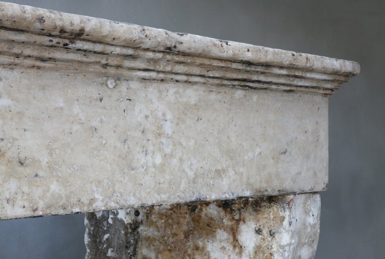 old mantelpiece of french limestone