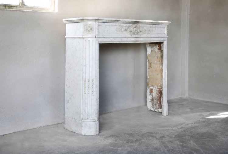 white carrara marble fireplace
