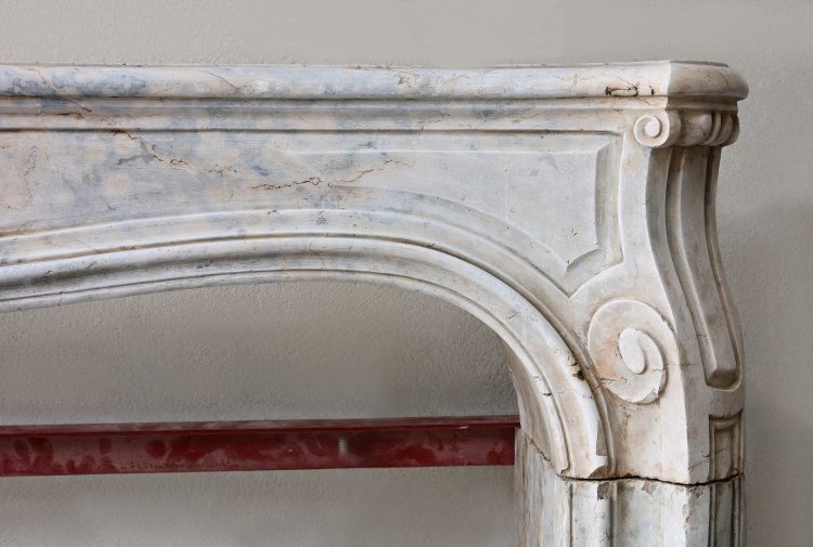 old mantle of french burgundy stone