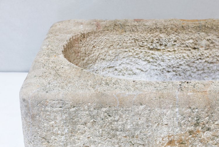 old wash basin of french limestone