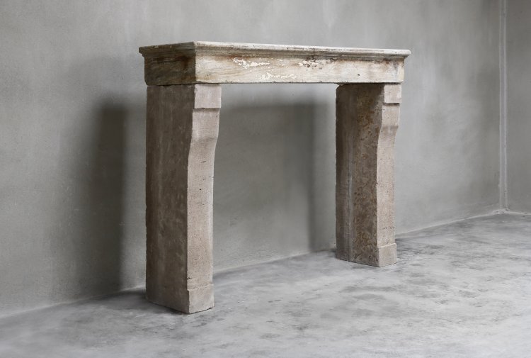 old french fireplace of limestone