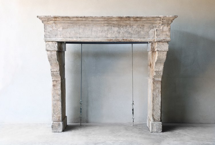antique mantle of french limestone
