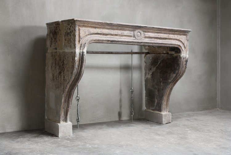 antique mantelpiece of limestone