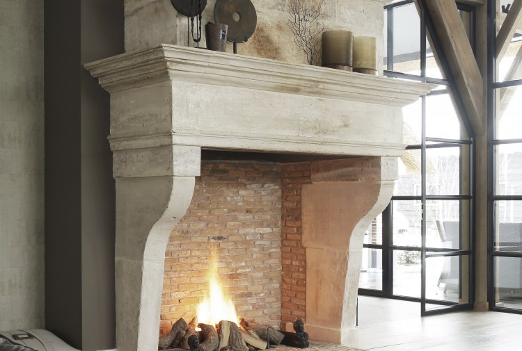 antique fireplace of limestone