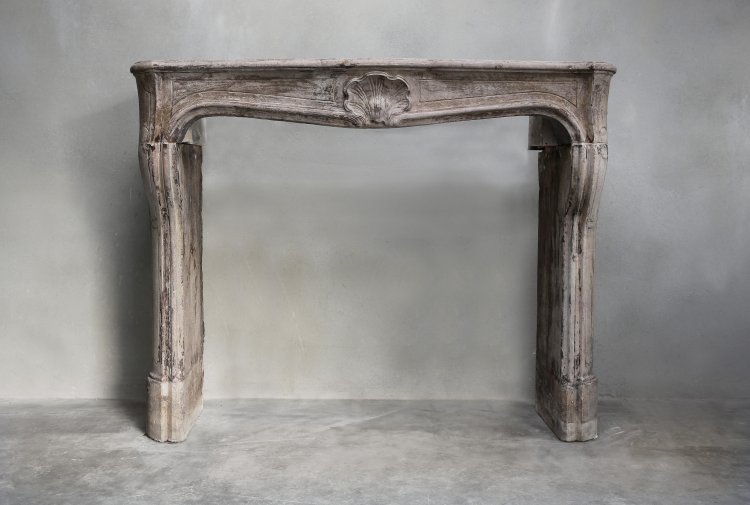 Antique limestone fireplace