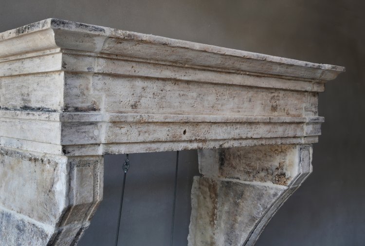 Campagnarde style fireplace of limestone