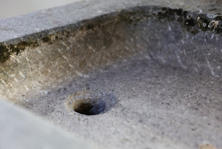 old wash basin of belgian bluestone