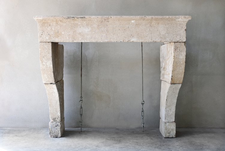 antique fireplace of limestone