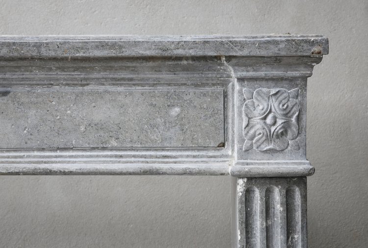 antique grey marblestone fireplace