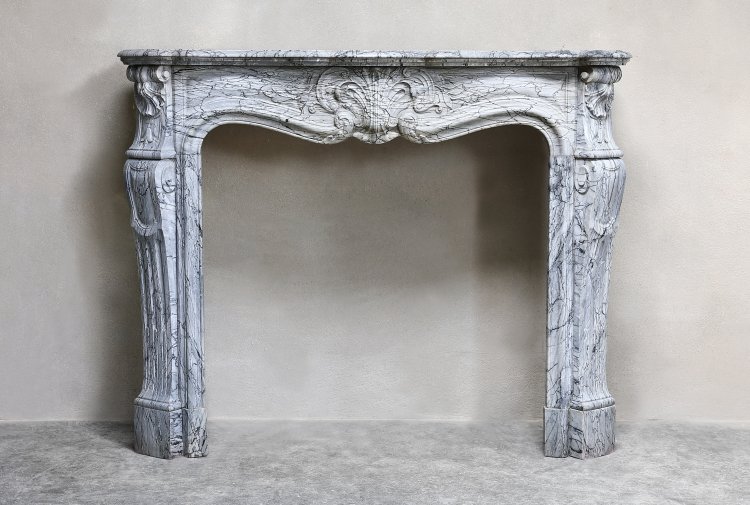 blue fleuri marble fireplace