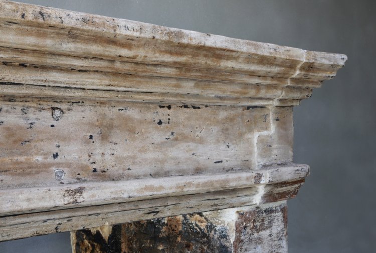 antique french limestone fireplace