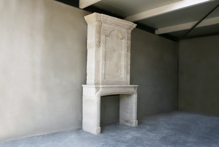 french limestone fireplace with trumeau