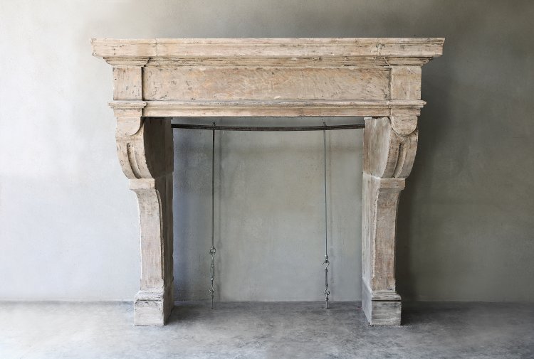 reclaimed french limestone fireplace