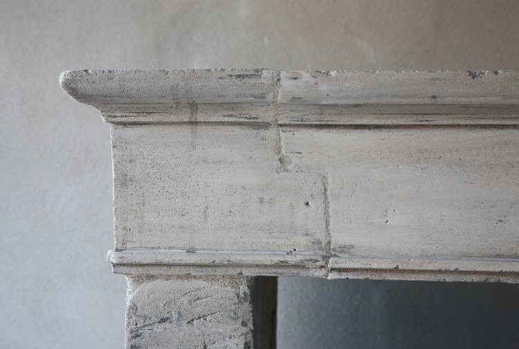 antique limestone fireplace