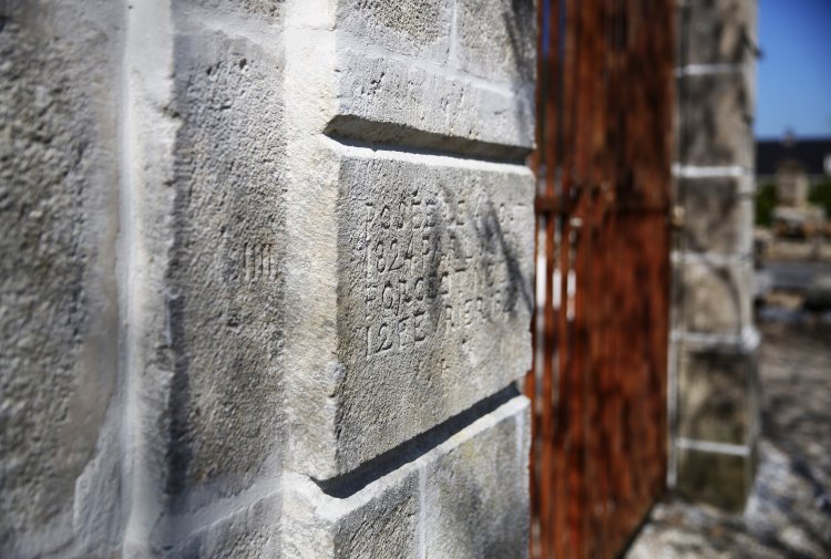 18th century gate from iron and limestone