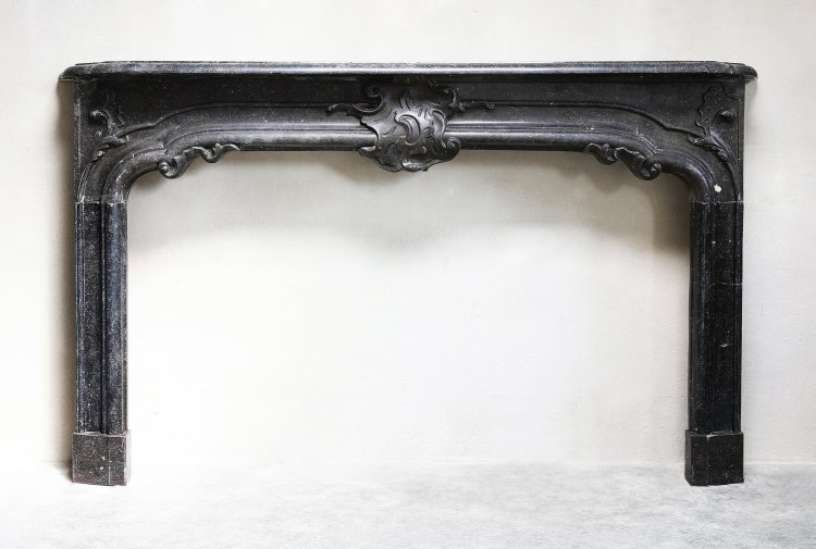 antique fireplace of belgian bluestone